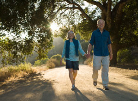 older couple holding hands